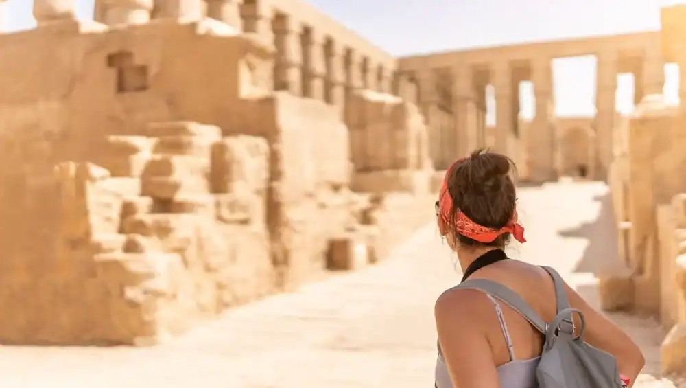 Visitor exploring the Temple of Karnak